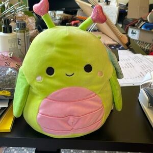 Squishmallow Hadeon, green body @9” and pink belly. Heart antennas-2”.